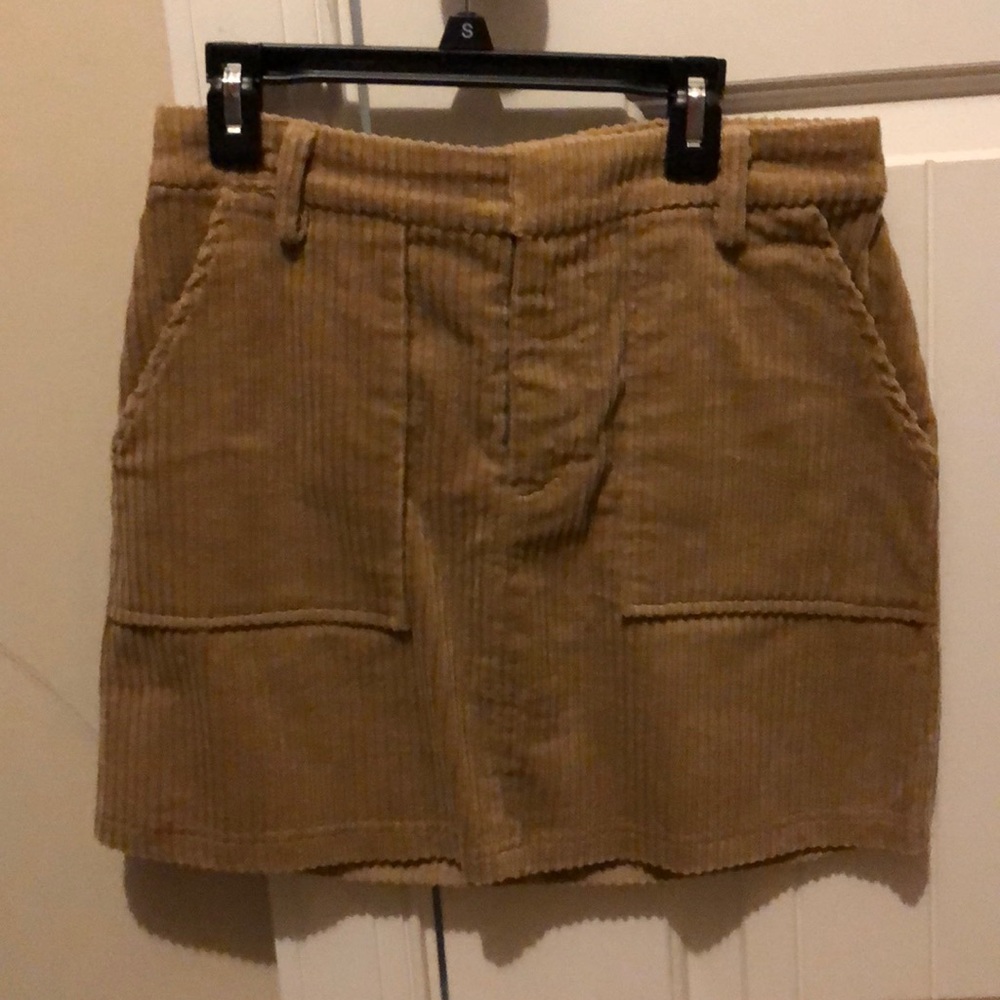 Tan above the knee skirt